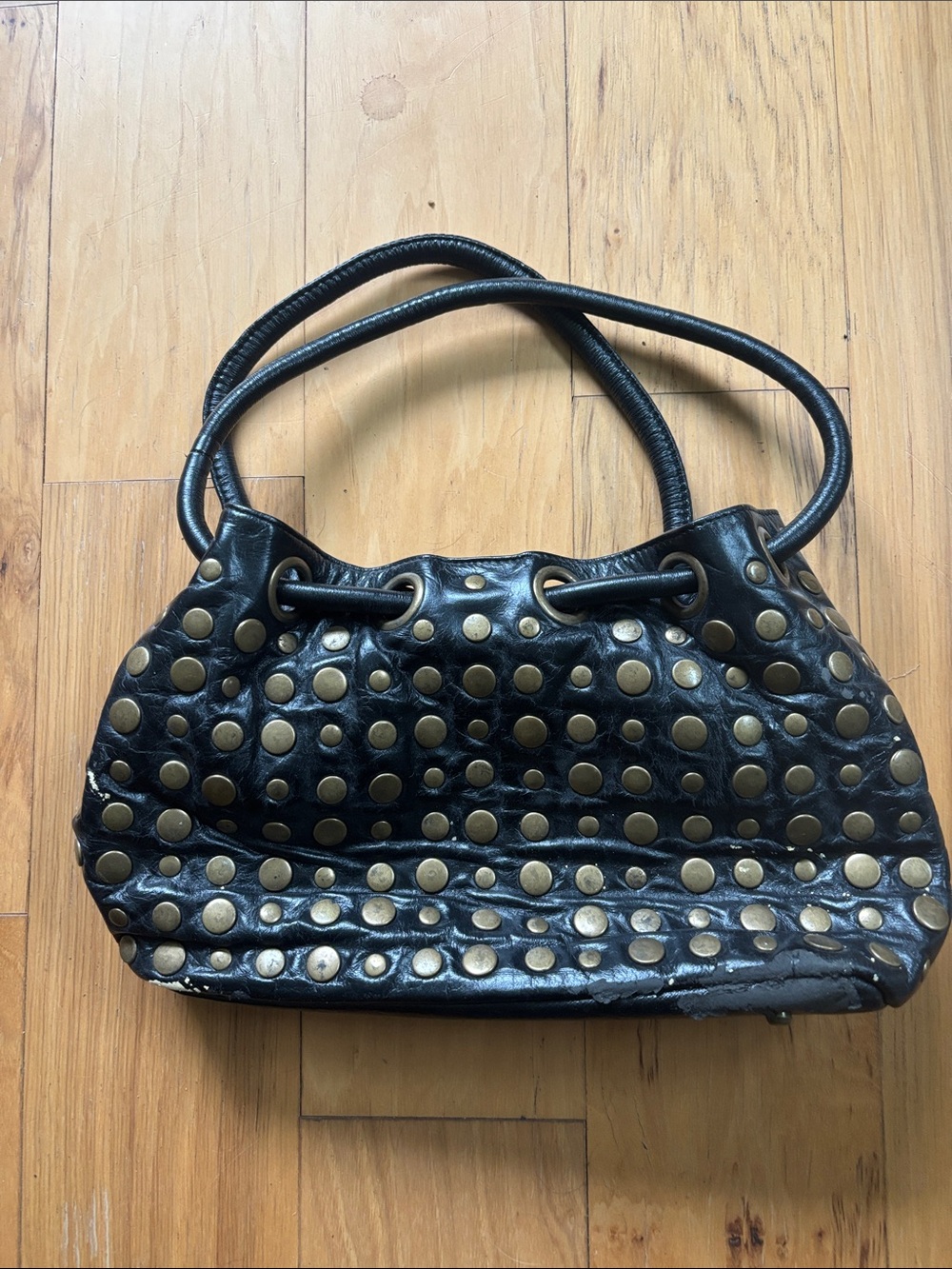 The Find studded and riveted handbag.